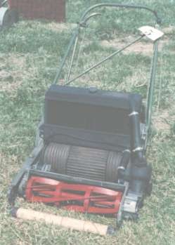 The "unusual" John Shaw Governor motor mower with water cooled engine and radiator.